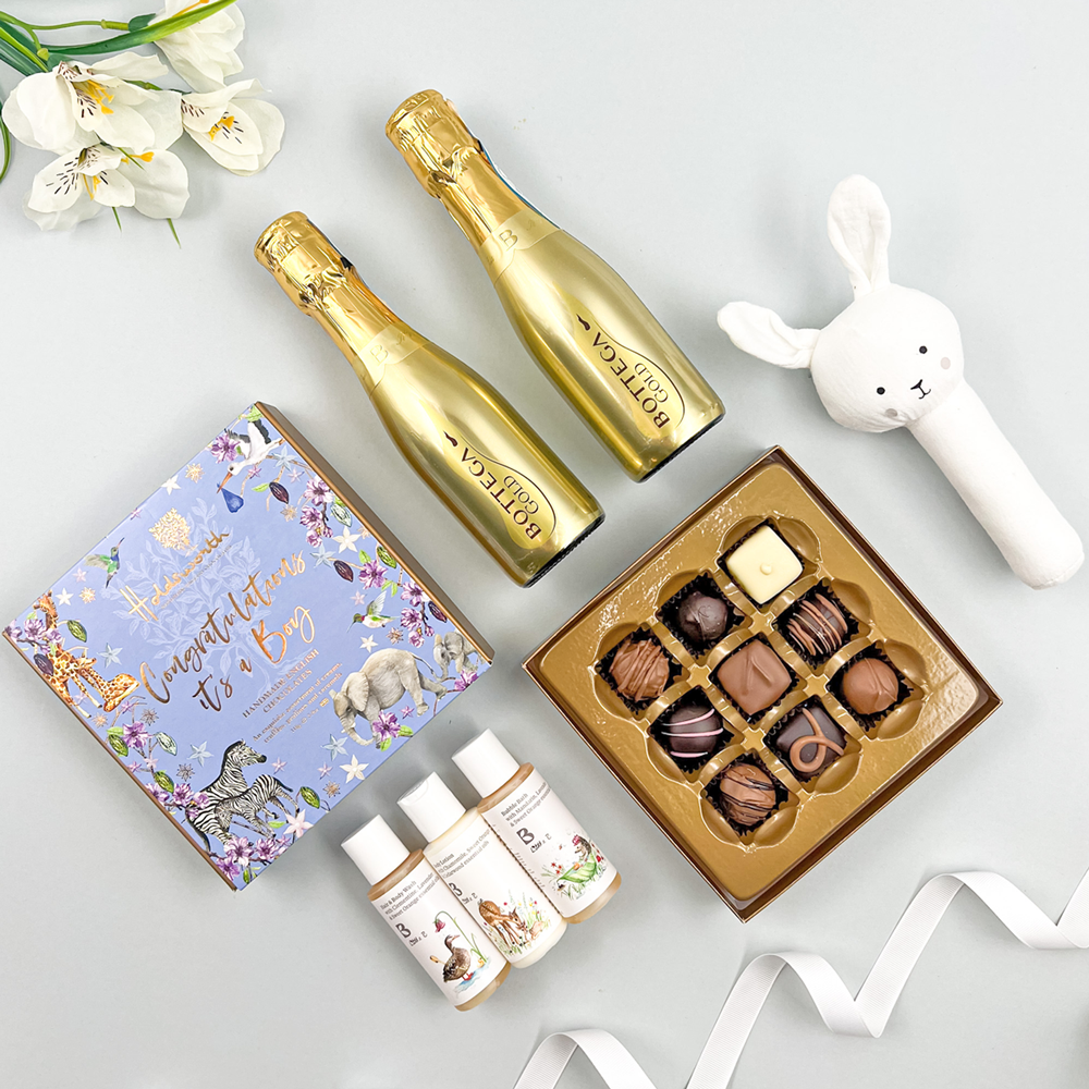 Luxury baby boy gift hamper with prosecco chocolates baby rattle and baby toiletries gift box