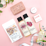 Bath & Body Pamper Hamper For Her featuring Bramley Body Wash and Body Lotion, aromatherapy bath salts, rose soap, and a Lovely lip balm presented in a kraft gift box.