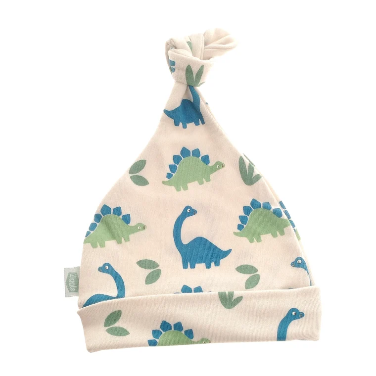New baby boy gift hamper with dinosaur rattle and baby essentials