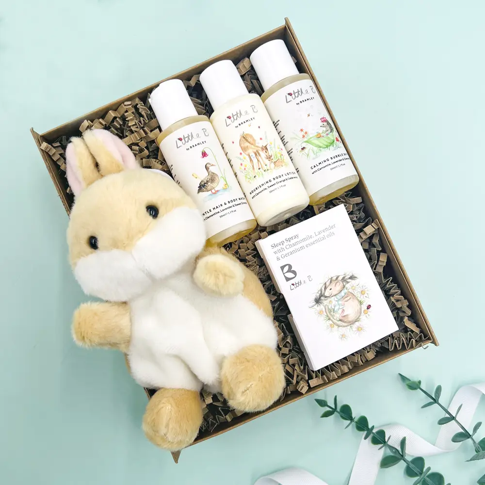New baby gift hamper with bunny soft toy and baby toiletries