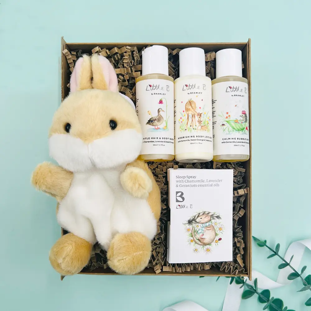 New baby gift hamper with bunny soft toy and baby toiletries