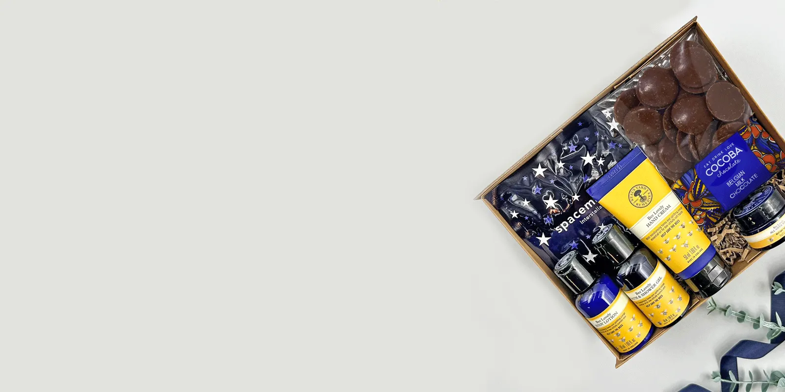 Get well soon hamper for him with snacks, chocolates, skincare and thoughtful care package items