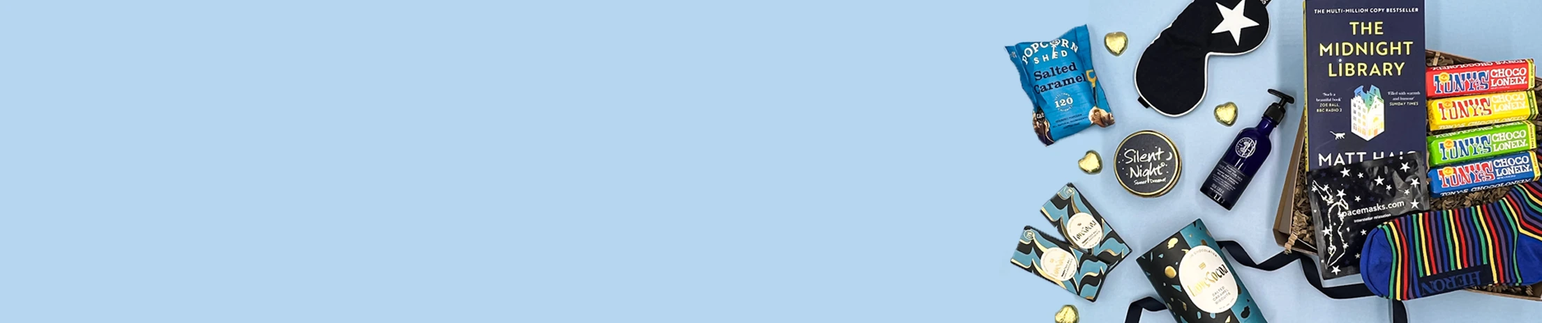 Gift hamper for him with snacks, grooming products and novelty items, for any occasion.