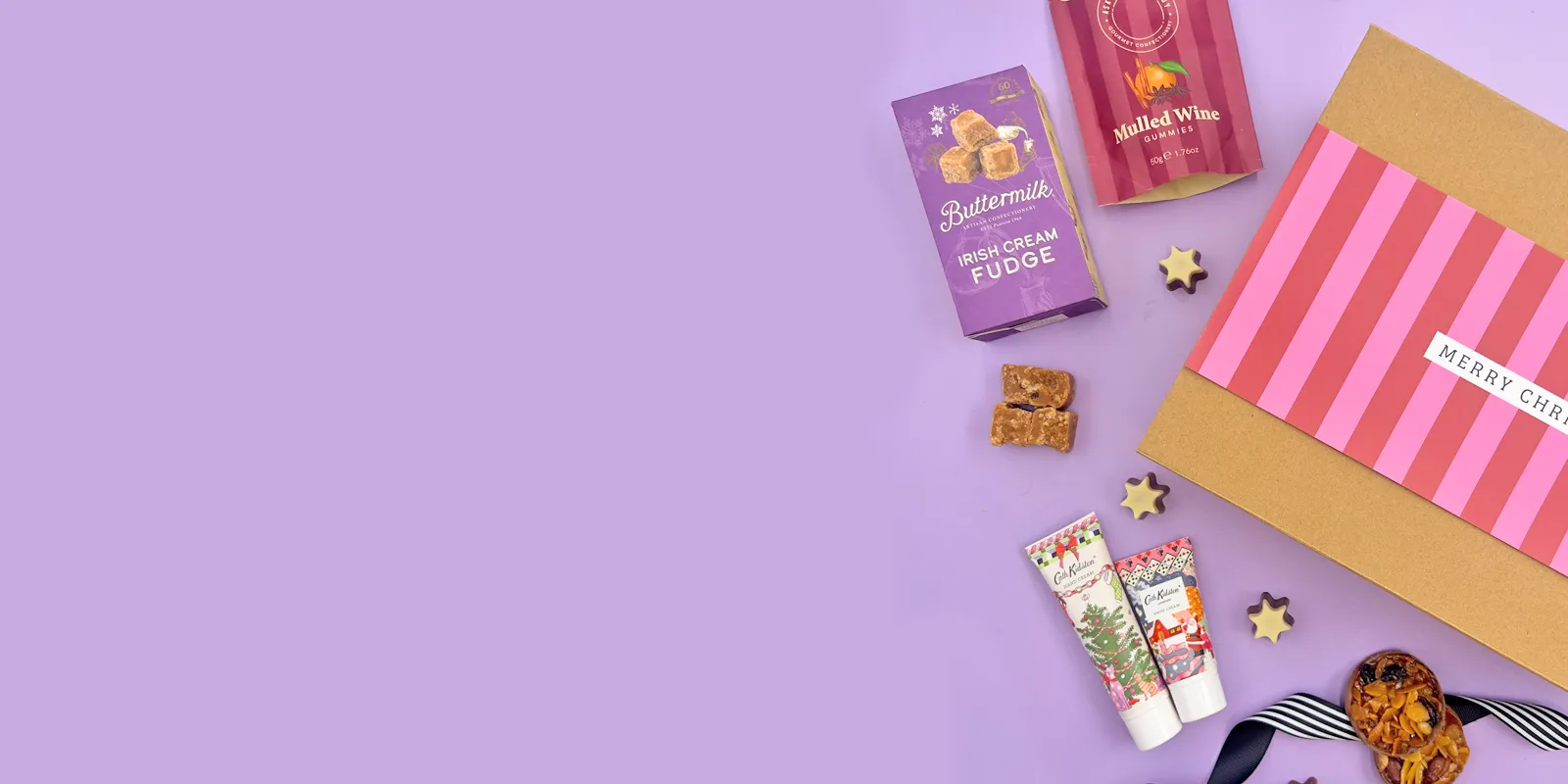 Christmas gift box for her with sweets, pamper items and festive treats