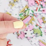 happily-mini-jigsaw-puzzle-piece-pinch