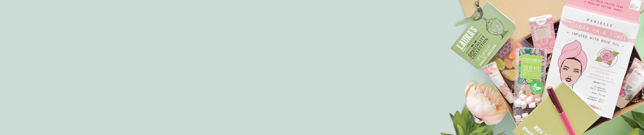 Mindfulness gift box with relaxation items, book and cosy socks. Including vegan chocolate and sweets. For any gender and any occasion.