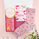 Motivational letterbox hamper with pink socks, chocolate and sweet treats