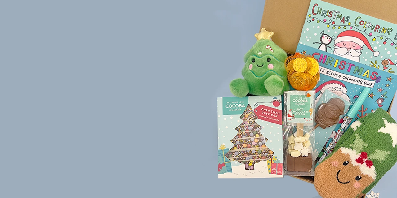 Ready-made Christmas Eve gift box for kids with colouring books, hot chocolate,