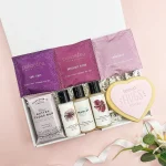 Thinking of you letterbox hamper with tea bags, fudge, toiletries and heart biscuit