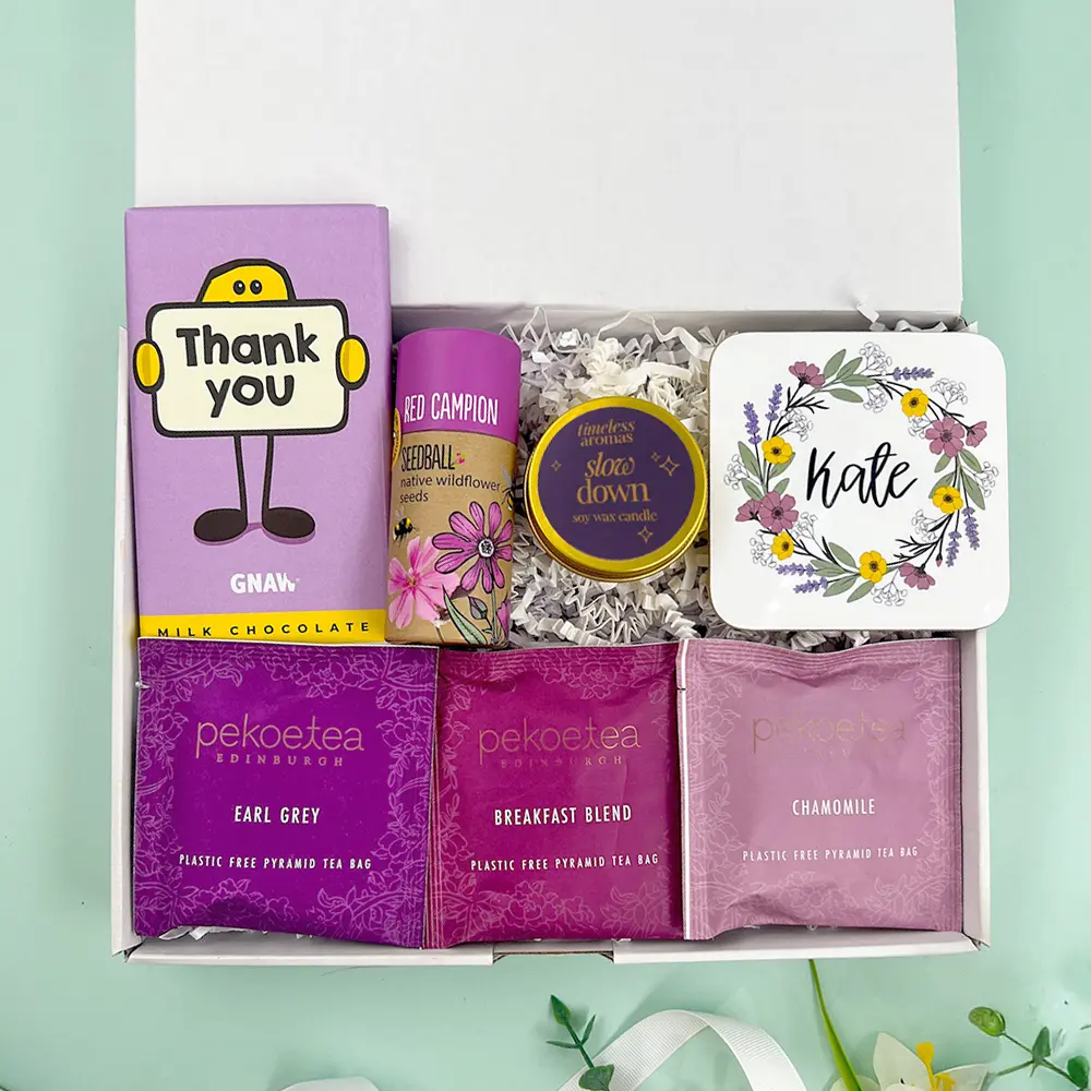 Thank You Treats Through The Letterbox Gift with chocolate, candle, eye mask, notebook and bath salts