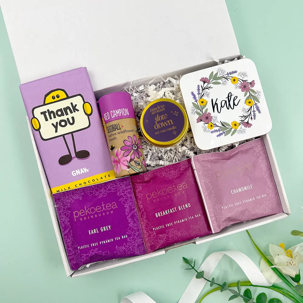 Thank You Treats Through The Letterbox Gift with chocolate, candle, eye mask, notebook and bath salts