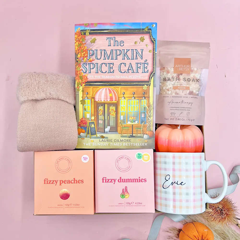 Happy Vibes Letterbox Gift with The Happy Newspaper, chocolate, colourful socks and jelly beans