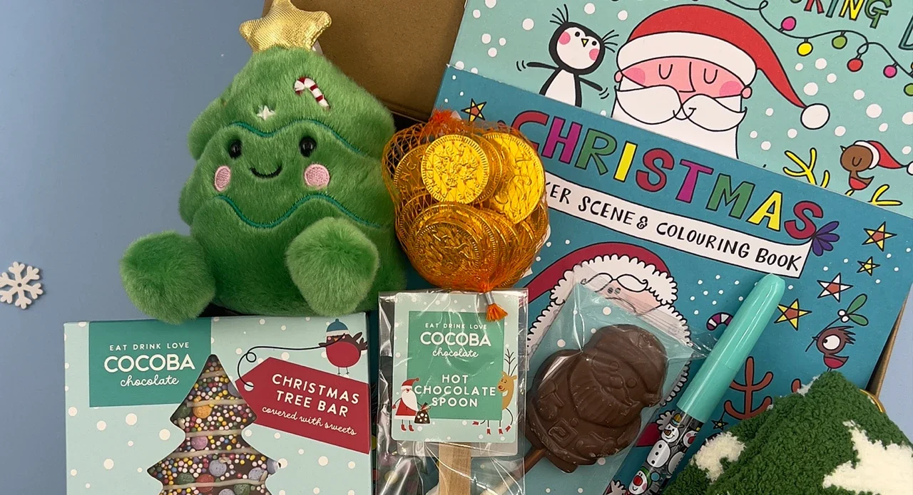 Ready-made Christmas Eve gift box for kids with colouring books, hot chocolate,